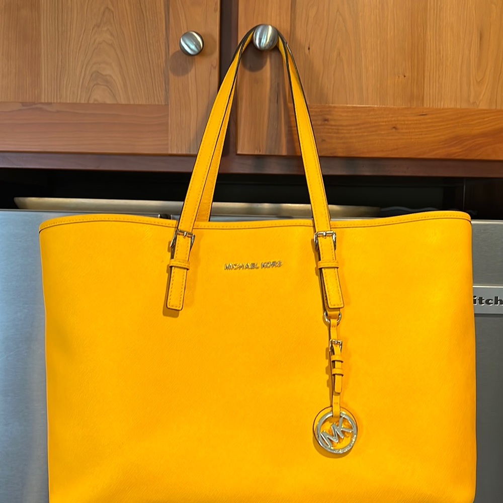 MICHAEL Jet Set Travel Tote Saffiano Sunflower Leather.  Divider zip pocket.